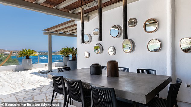 A look inside the jaw-dropping villa tennis star Stefanos Tsitsipas is renting in Mykonos shows celebrities certainly know how to celebrate life post-lockdown (the terrace is seen)